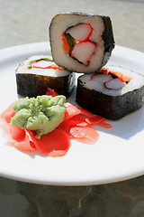 Image showing Sushi next to Wasabi and Sushi Ginger