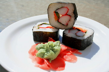 Image showing Sushi next to Wasabi and Sushi Ginger