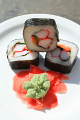 Image showing Sushi next to Wasabi and Sushi Ginger