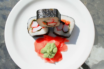 Image showing Sushi next to Wasabi and Sushi Ginger