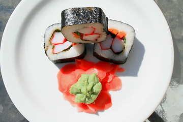 Image showing Sushi next to Wasabi and Sushi Ginger