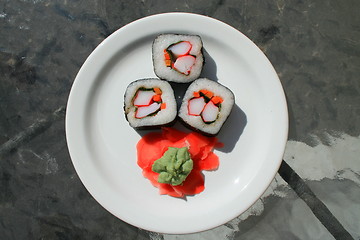 Image showing Sushi next to Wasabi and Sushi Ginger