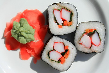 Image showing Sushi next to Wasabi and Sushi Ginger