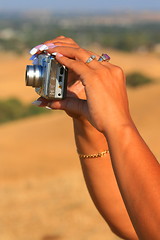 Image showing Womans Hands Holding Digital Camera