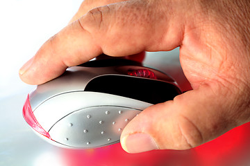 Image showing Older hand with computer mouse