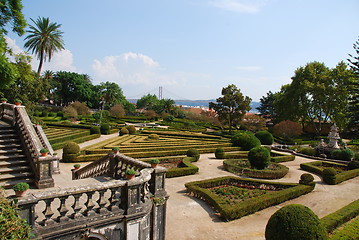 Image showing Enchanted Ajuda garden with April 25th bridge in Lisbon, Portugal