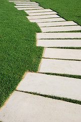 Image showing Serpentine pathway stones on a park lawn (concept)