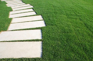 Image showing Serpentine pathway stones on a park lawn (concept)