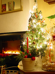 Image showing Christmas tree and fireplace.