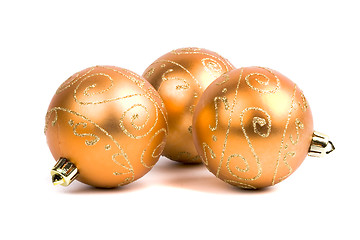 Image showing three golden christmas balls