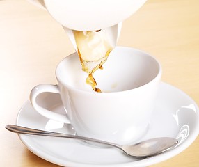 Image showing Pouring coffee