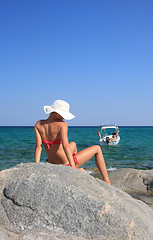 Image showing tanned woman in bikini in the sea