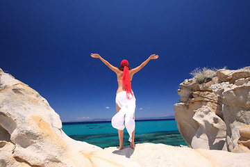 Image showing tanned woman in bikini in the sea