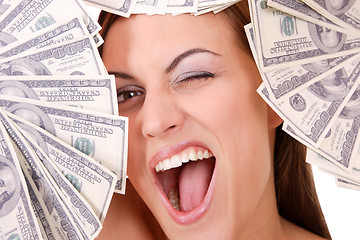 Image showing Attractive woman takes lot of 100 dollar bills