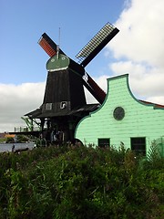 Image showing Windmill and storage house.