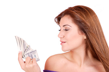 Image showing young woman holding money in the hand