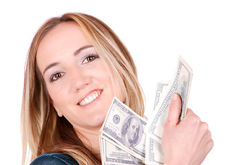 Image showing young woman holding money in the hand