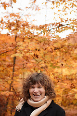 Image showing Autumn - happy middle aged woman laughing