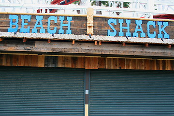 Image showing Beach Shack Sign and Totem Pole
