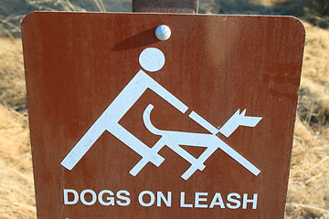Image showing Dogs on Leash Sign