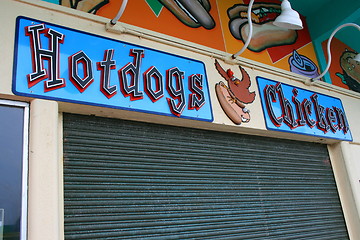 Image showing Funny Hot Dogs and Chicken Sign