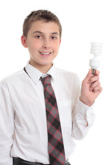 Image showing Student holding eco friendly light bulb