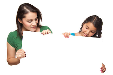 Image showing Pretty Hispanic Girl and Mother Holding Blank Board