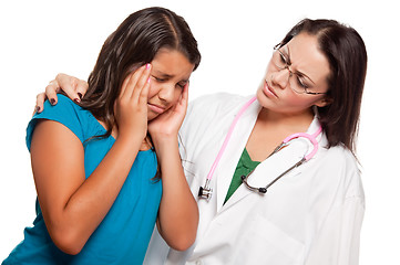 Image showing Unhappy Hispanic Girl and Concerned Female Doctor