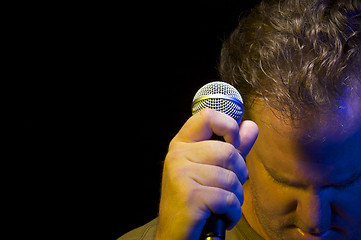 Image showing Passionate Vocalist & Microphone