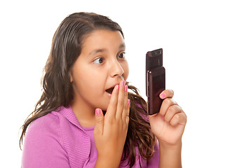 Image showing Shocked Pretty Hispanic Girl On Cell Phone