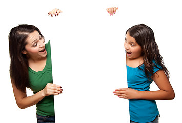 Image showing Pretty Hispanic Girl and Mother Holding Blank Board