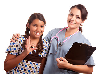 Image showing Pretty Hispanic Girl and Female Doctor Isolated