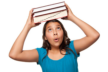 Image showing Pretty Hispanic Girl with Books on Her Head