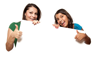 Image showing Pretty Hispanic Girl and Mother Holding Blank Board