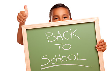 Image showing Cute Hispanic Boy Holding Chalkboard with Back to School