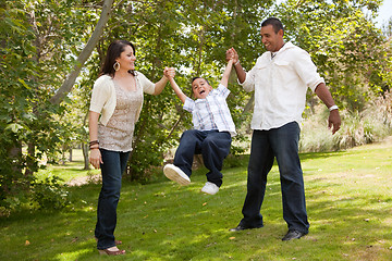 Image showing Young Family Having Fun in the Park