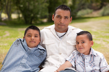 Image showing Father and Sons in the Park