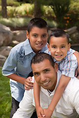 Image showing Father and Sons in the Park