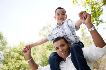 Image showing Hispanic Father and Son Having Fun in the Park