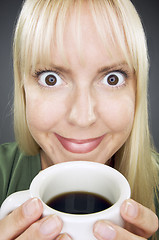 Image showing Beautiful Woman Enjoys Coffee