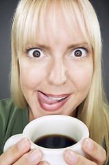 Image showing Beautiful Woman Enjoys Coffee