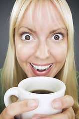 Image showing Beautiful Woman Enjoys Coffee