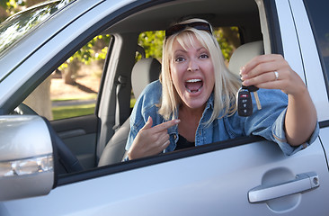 Image showing Attractive Woman In New Car with Keys