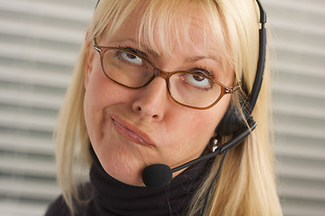 Image showing Attractive Businesswoman with Phone Headset