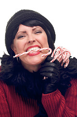 Image showing Attractive Woman Holds Candy Canes