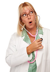 Image showing Attractive Female Doctor or Nurse Checking Her Own Heart