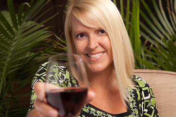 Image showing Beautiful Blonde Enjoying Wine