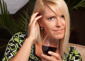 Image showing Beautiful Blonde Woman Enjoying Wine