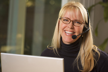 Image showing Attractive Businesswoman with Phone Headset