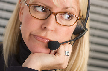 Image showing Attractive Businesswoman with Phone Headset